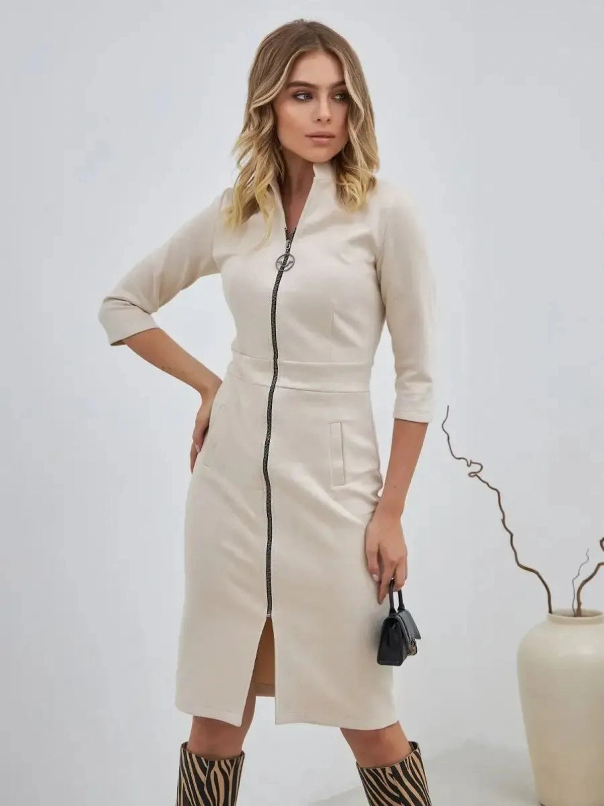 Sedona Mini Dress by Lauven in soft sculpted silhouette with a zip-front design and elegant styling.