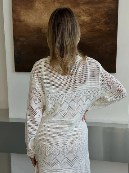 Aurelia Maxi Dress by Lauven showcasing its airy crochet elegance from the back, perfect for summer styling.