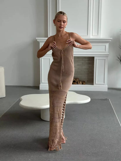 Calysta Maxi Dress by Lauven showcasing soft knit texture and fringe hem movement in a warm beige tone.