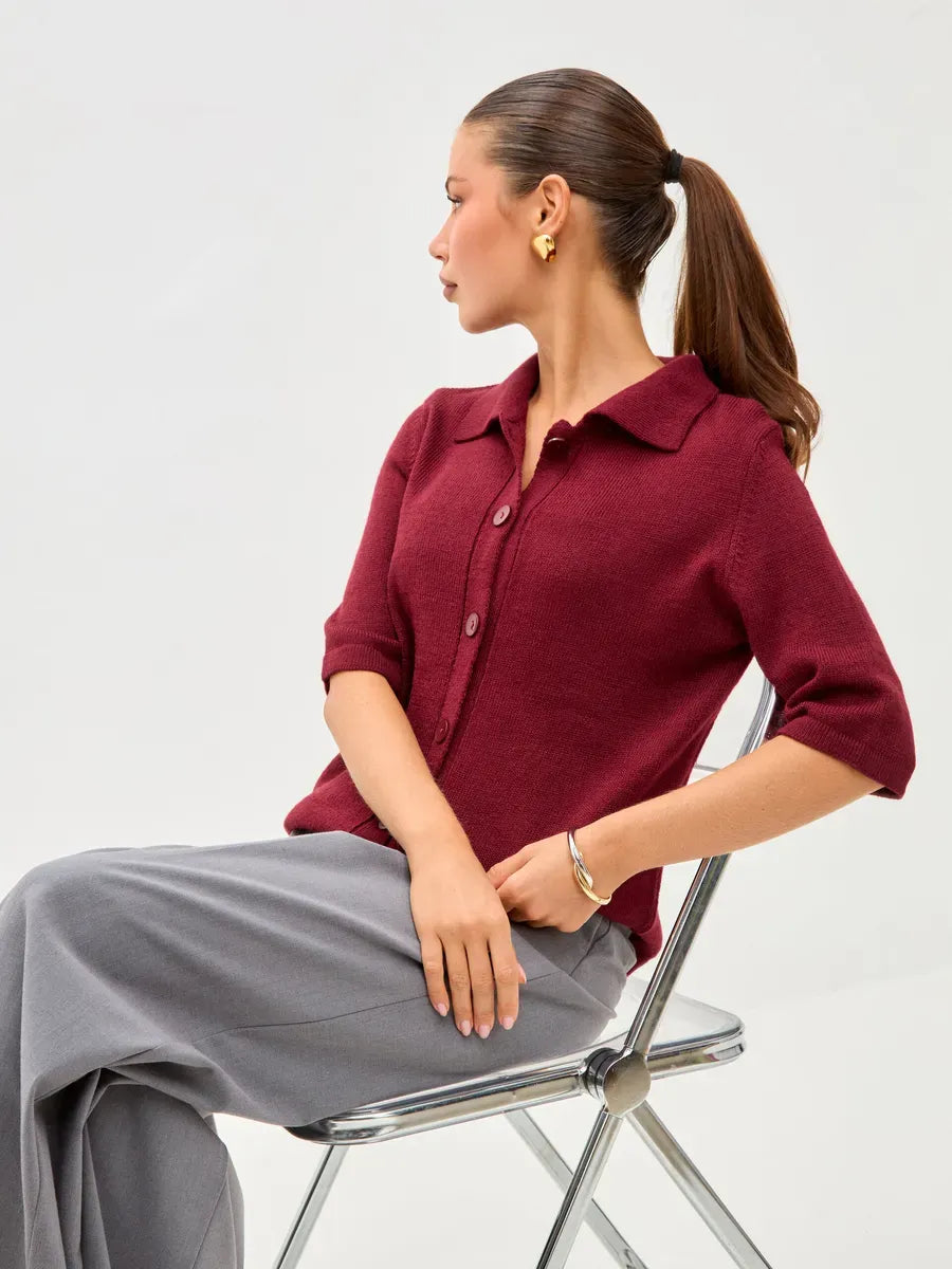 Mira Cardigan by Lauven, lightweight burgundy wool blend knitwear with button closure on stylish model.