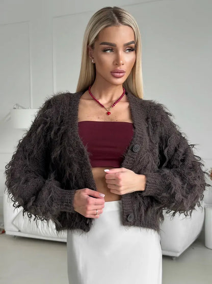 Espresso Cardigan by Lauven, cropped oversized brown bouclé knit with feathered fringe worn by model.