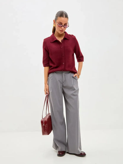 Mira Cardigan by Lauven, lightweight burgundy wool blend knitwear styled with gray trousers, perfect for autumn layering.