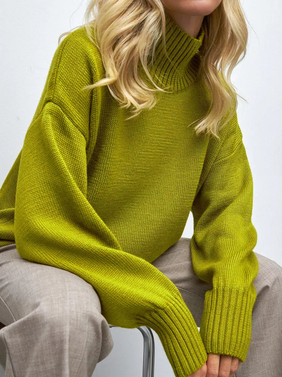 Vesper Sweater by Lauven - Oversized knit in vibrant pistachio with a high turtleneck, perfect for winter fashion.