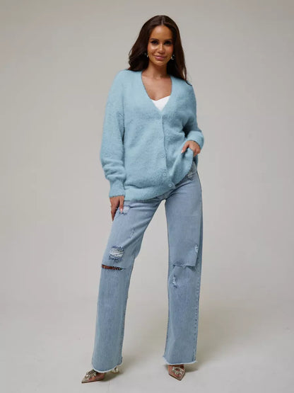 Skyler Cardigan by Lauven - Soft Blue Oversized Knitwear with Button Closure, styled with high-waisted jeans.