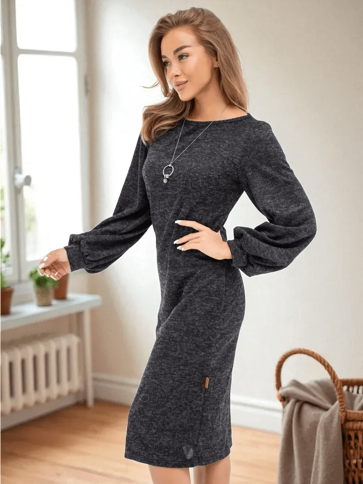 Noir Midi Dress by Lauven worn by a model in a sophisticated knit fabric, showcasing refined elegance in graphite black.