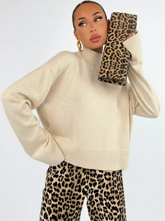 Eterna Sweater by Lauven, oversized light beige knitwear, paired with leopard print pants.