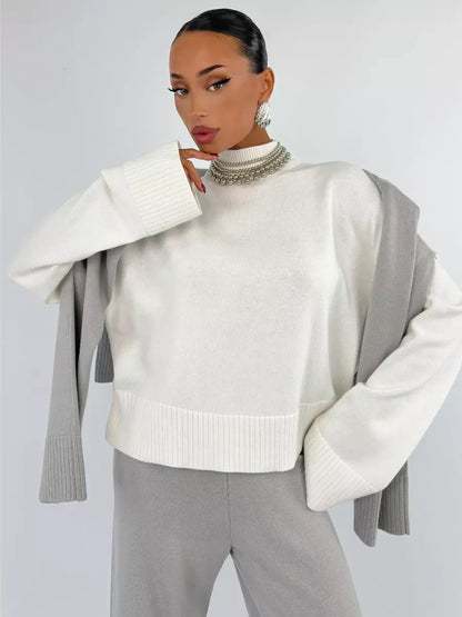 Bianca Sweater by Lauven, oversized cotton blend knit in white, showcasing elegance and comfort in a stylish outfit.