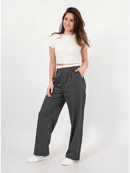 Luna Pants by Lauven, elegant high-waist wide-leg trousers with subtle pinstripe pattern in gray.