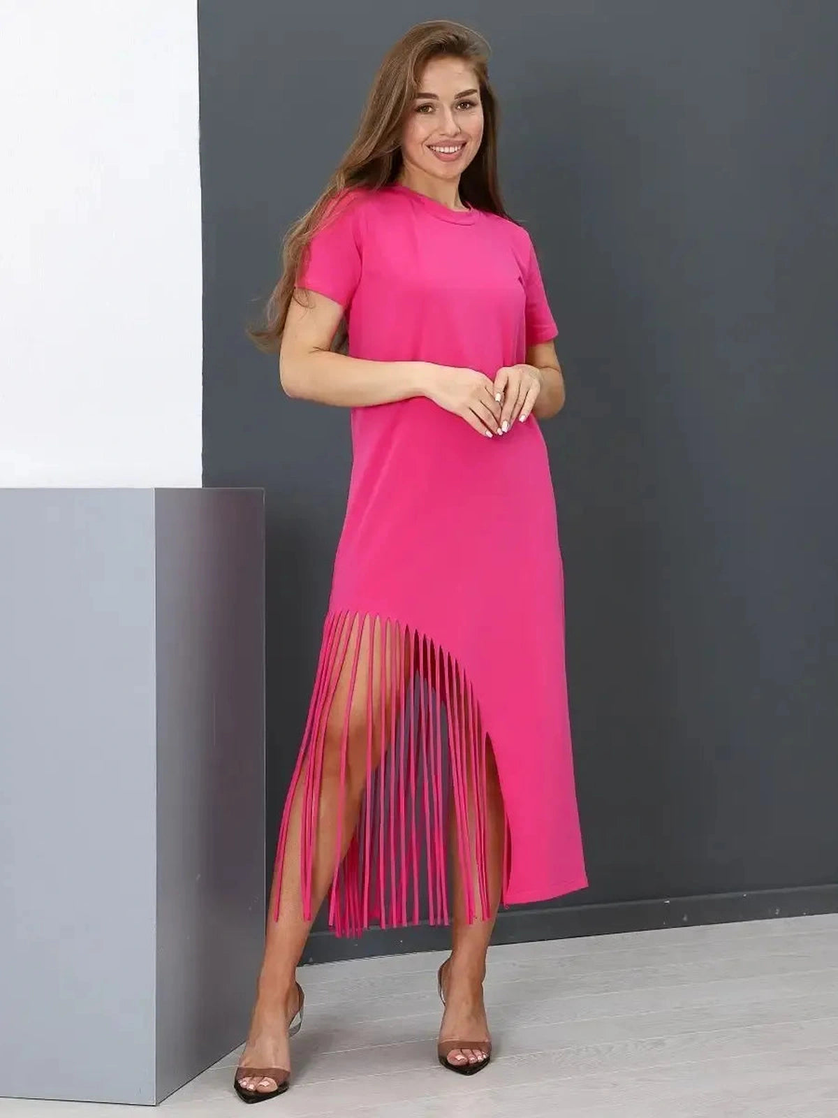 Capri Midi Dress by Lauven in fuchsia with fringe hem showcasing elegance and comfort.
