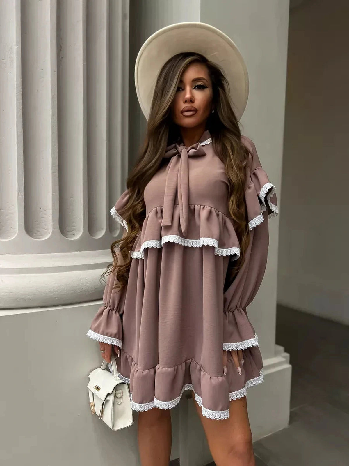 Aurora Mini Dress by Lauven featuring soft ruffles and delicate lace trim, perfect for stylish and comfortable wear.