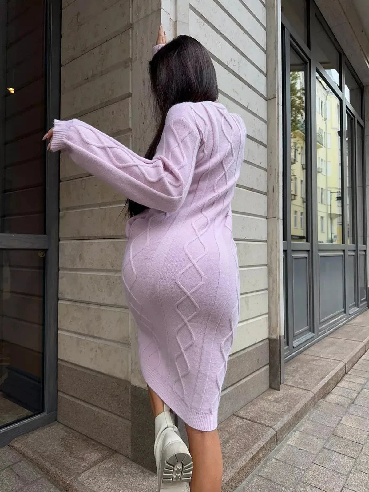 Luna Midi Dress in soft pink, textured knit sweater dress by Lauven, showcasing elegant fit and style.
