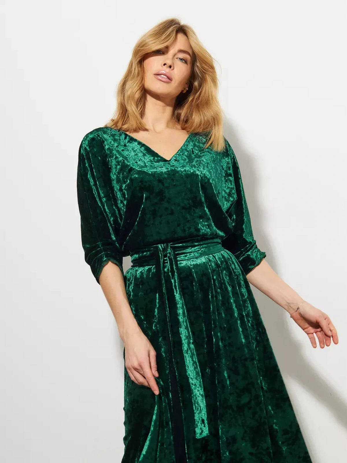 Emerelle Maxi Dress by Lauven, emerald green crushed velvet gown with soft V-neckline and flowing A-line skirt.