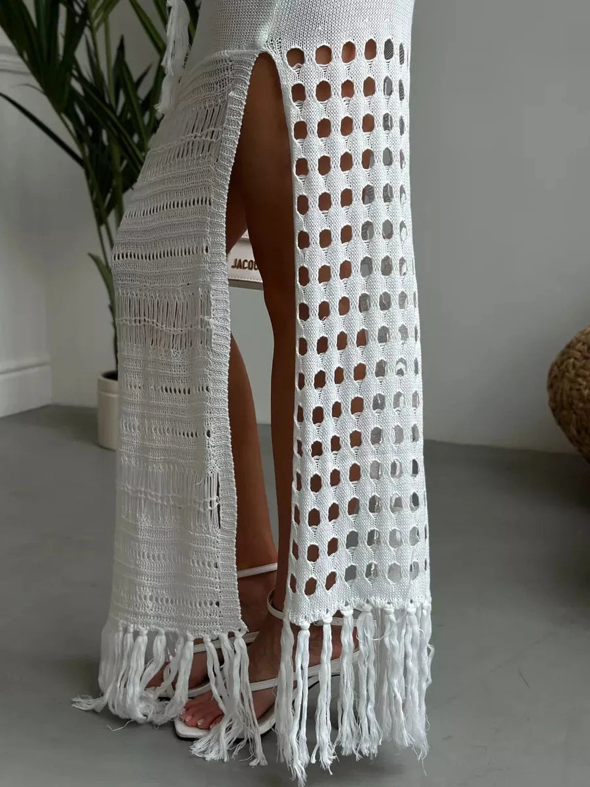 Solara Maxi Dress showcasing airy knit detailing and side slit elegance by Lauven.