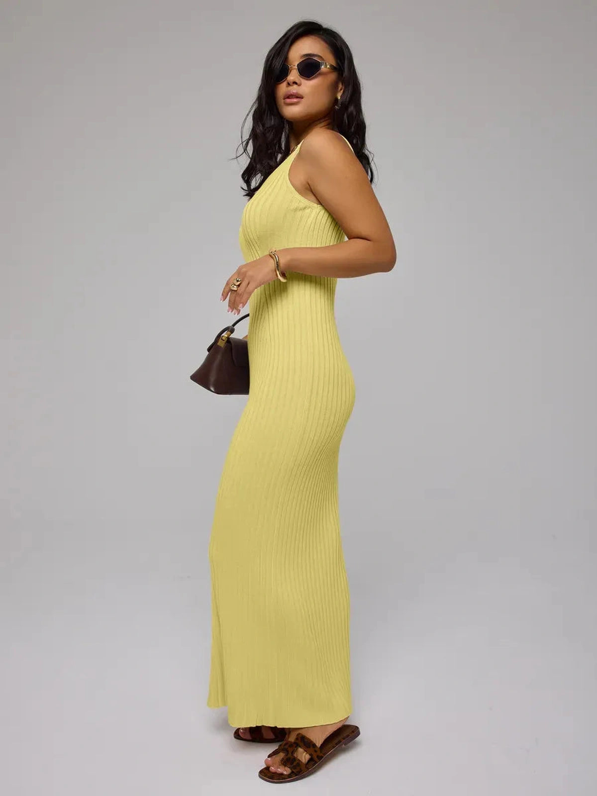 Soleil Maxi Dress by Lauven - Elegant yellow ribbed knit dress showcasing a modern, body-hugging silhouette.