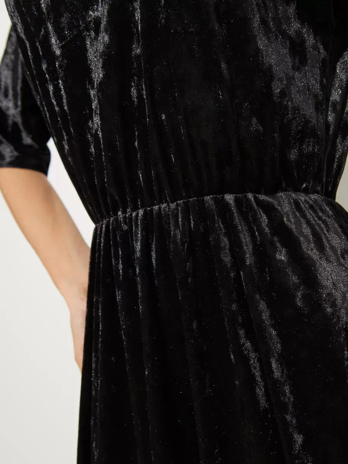 Noiré Maxi Dress by Lauven, showcasing the luxurious black velvet fabric and elegant A-line silhouette.