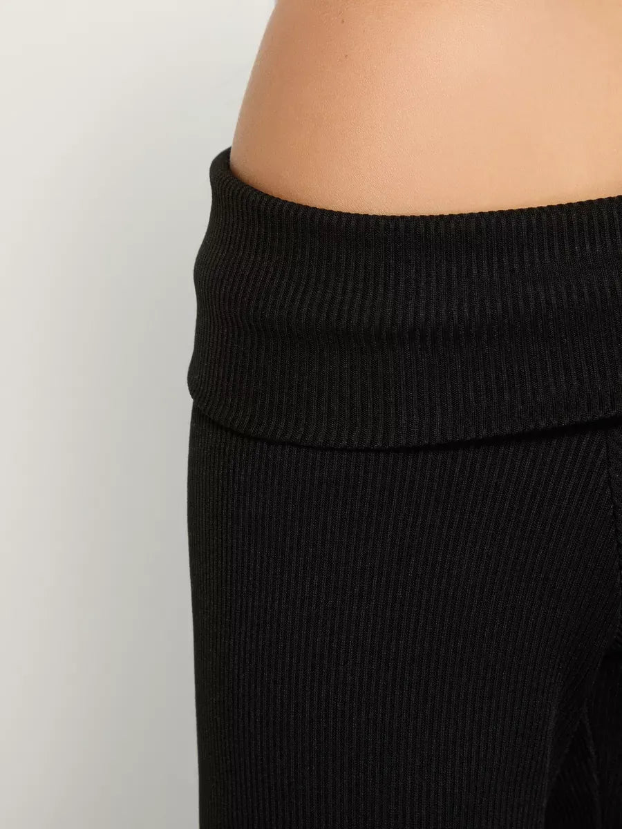 Onyx Two-Piece Set by Lauven - Close-up of the off-shoulder ribbed fabric detail on women's suit.