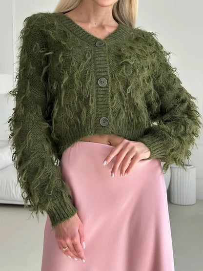 Olive Cardigan by Lauven featuring a cropped oversized khaki bouclé knit with feathered fringe detailing.