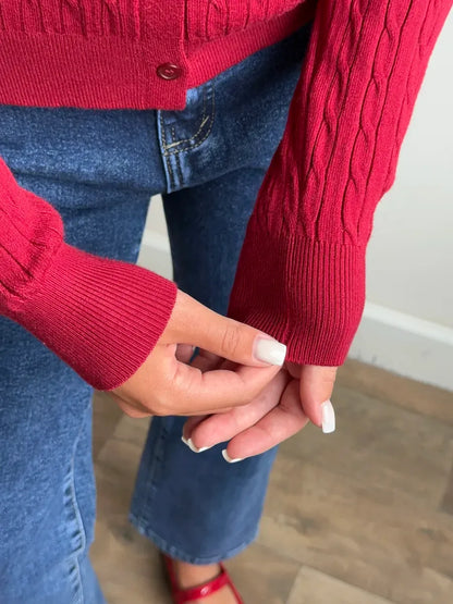 Sienna Cardigan by Lauven, showcasing elegant dark red knit with button detailing and textured sleeves.