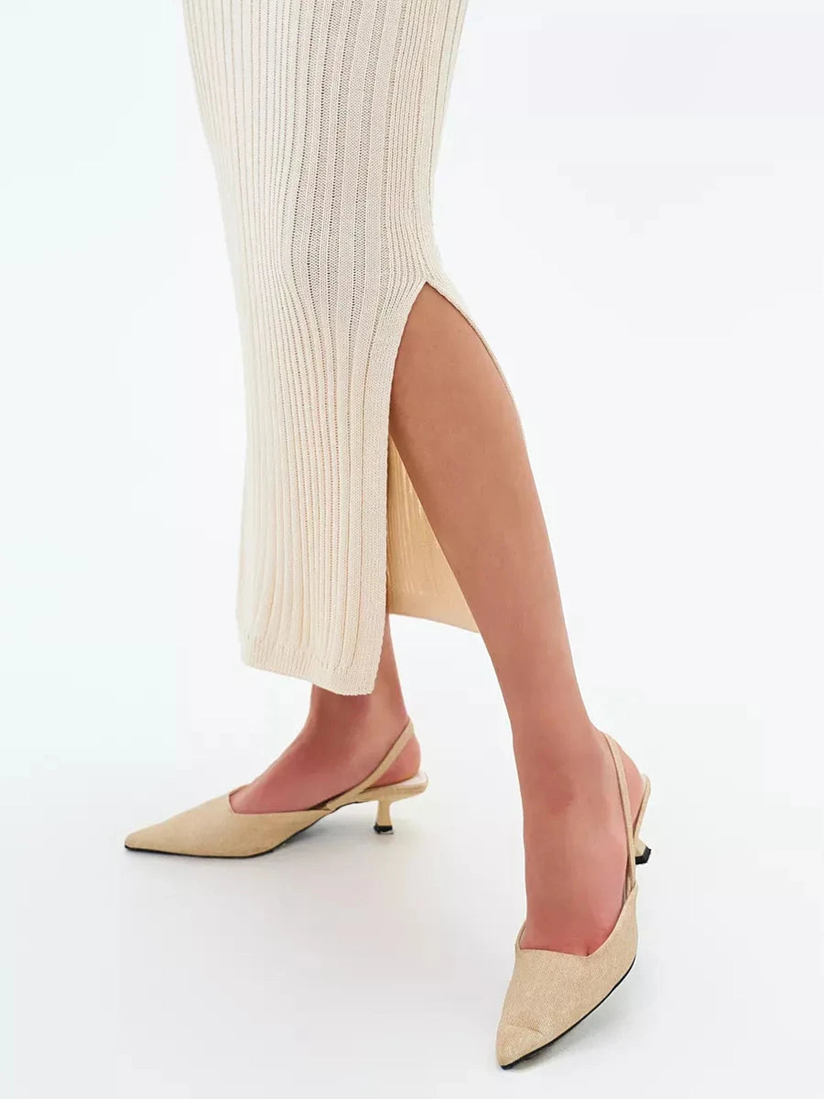 Evelyn Midi Dress side slit detail featuring elegant ribbed knit design by Lauven.