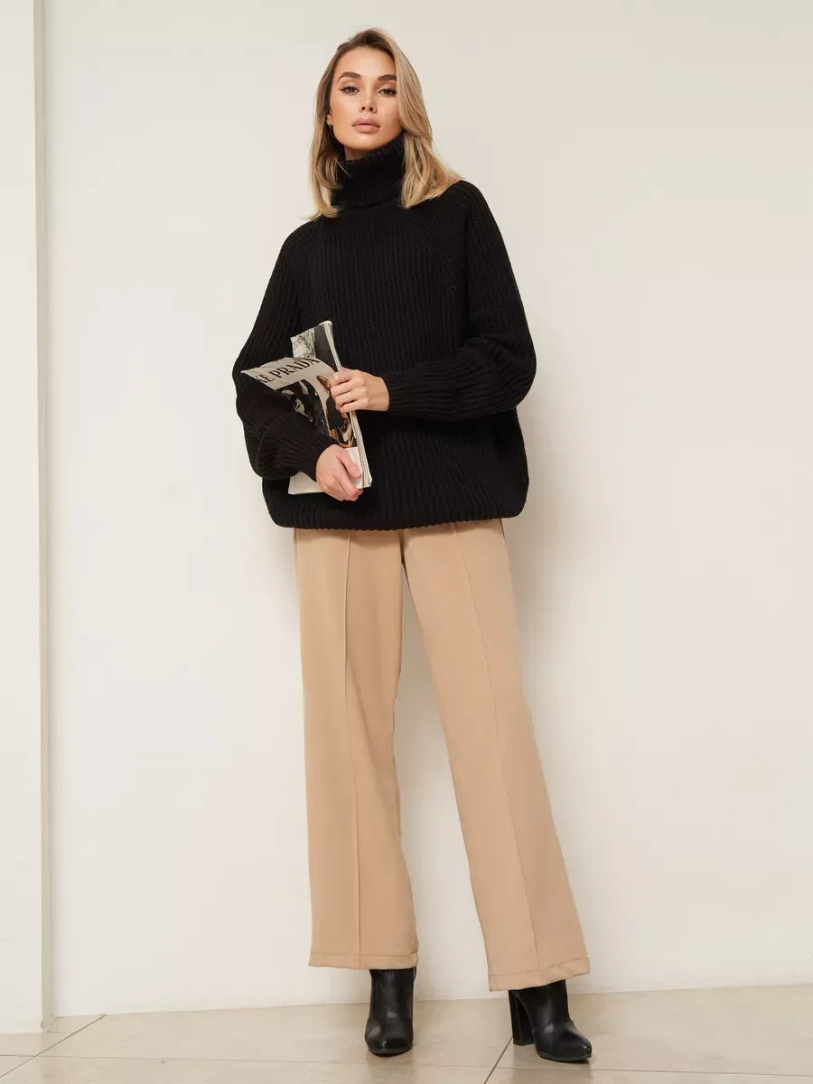 Onyx Sweater by Lauven — Oversized black knitwear with turtleneck for stylish winter comfort.