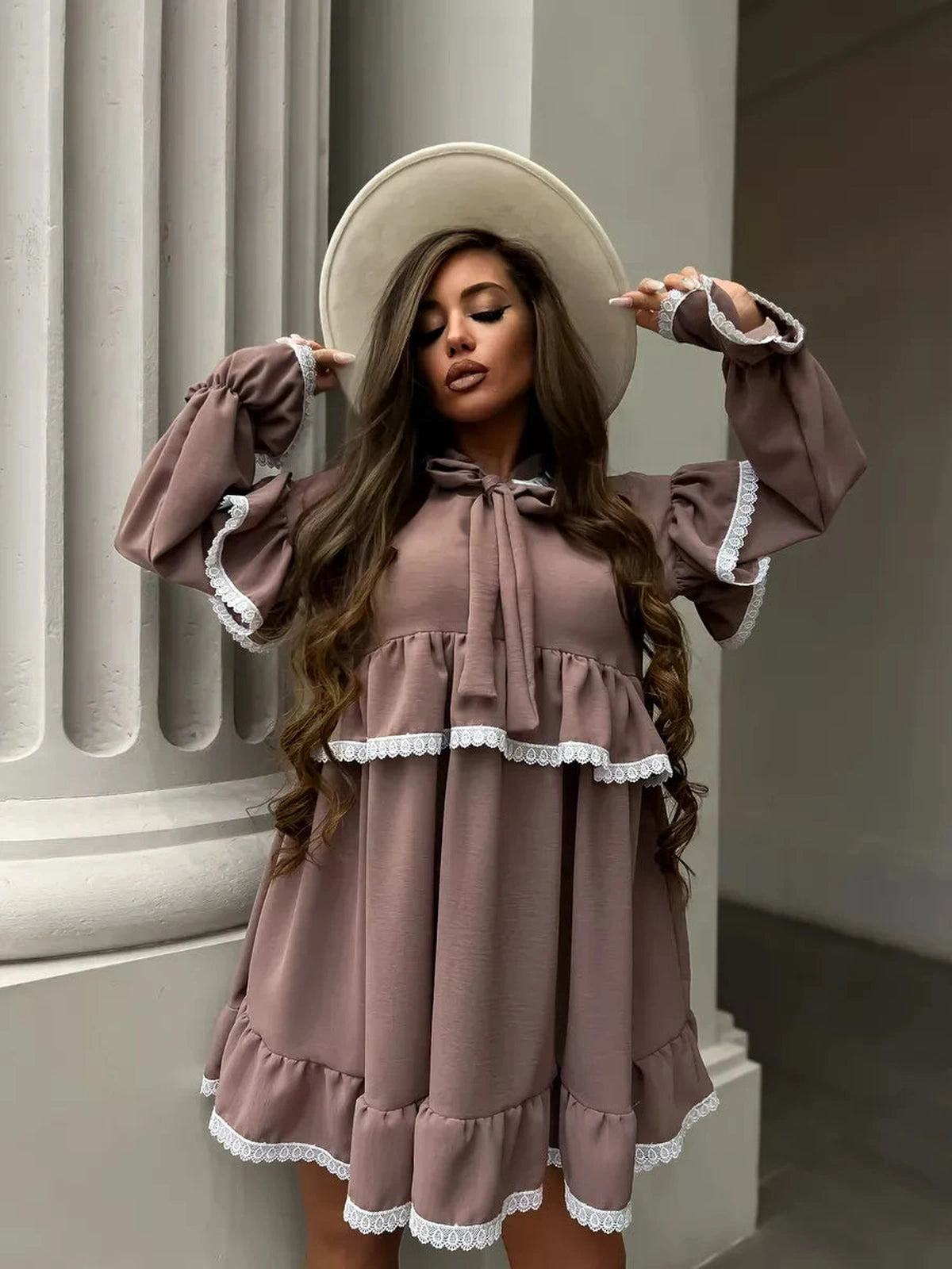 Aurora Mini Dress by Lauven featuring soft ruffles, delicate lace trim, and a stylish oversized cut.