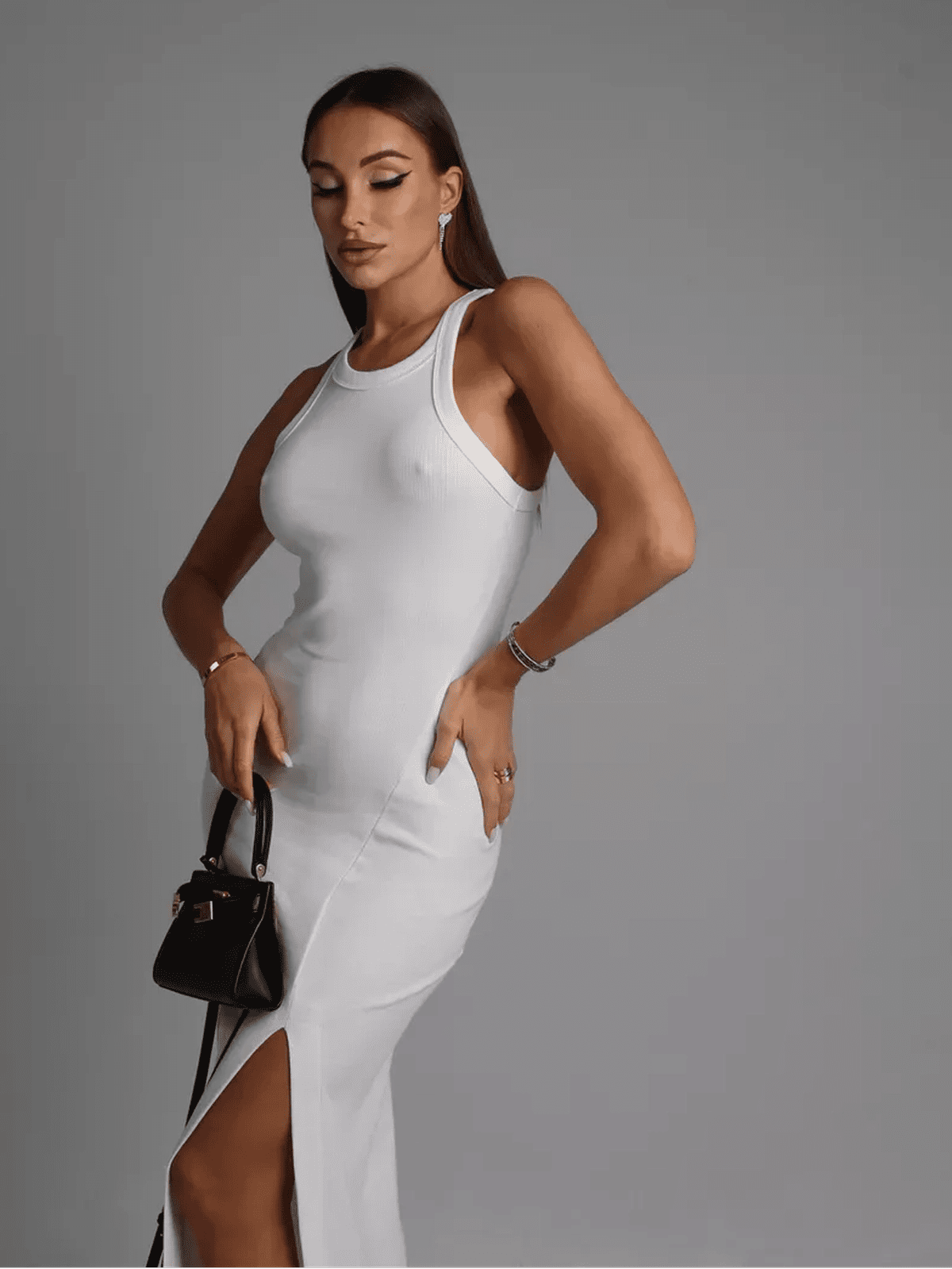 Vega Maxi Dress by Lauven featuring a sleek ribbed silhouette and side slit for elegant movement.