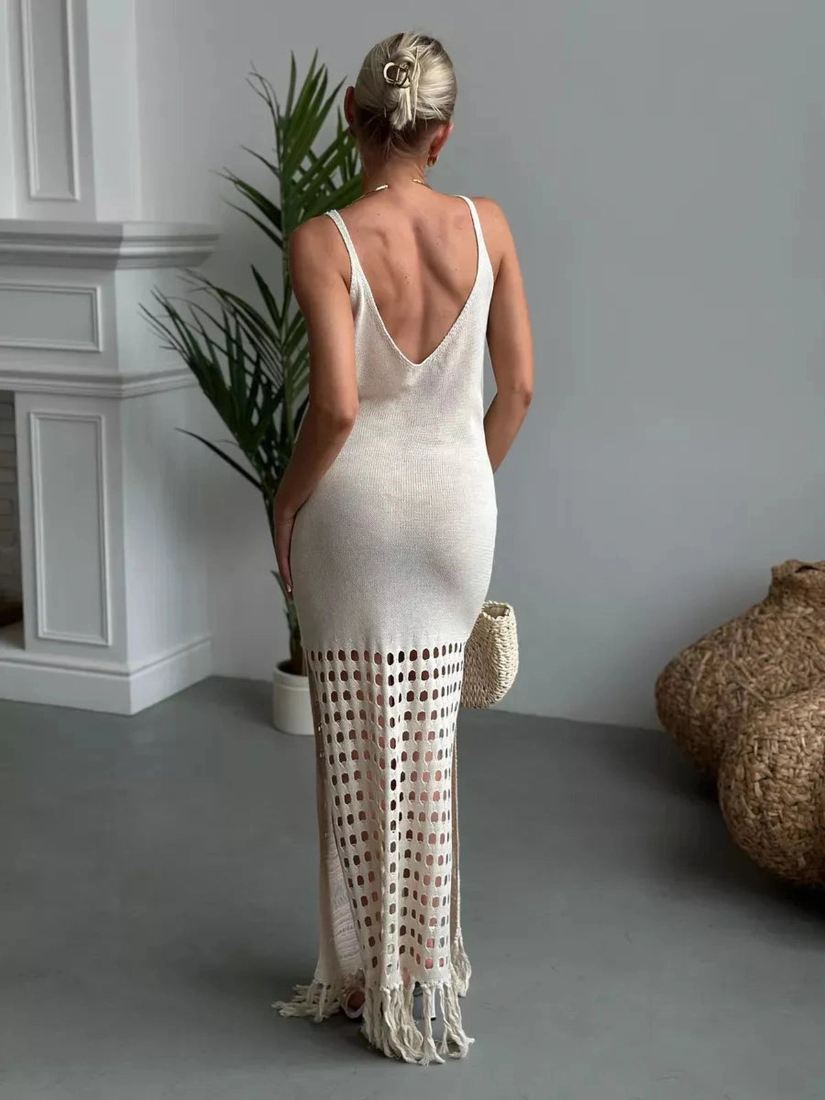 Lunara Maxi Dress by Lauven, showcasing a back view with openwork elegance and fringe hem for a stylish summer look.