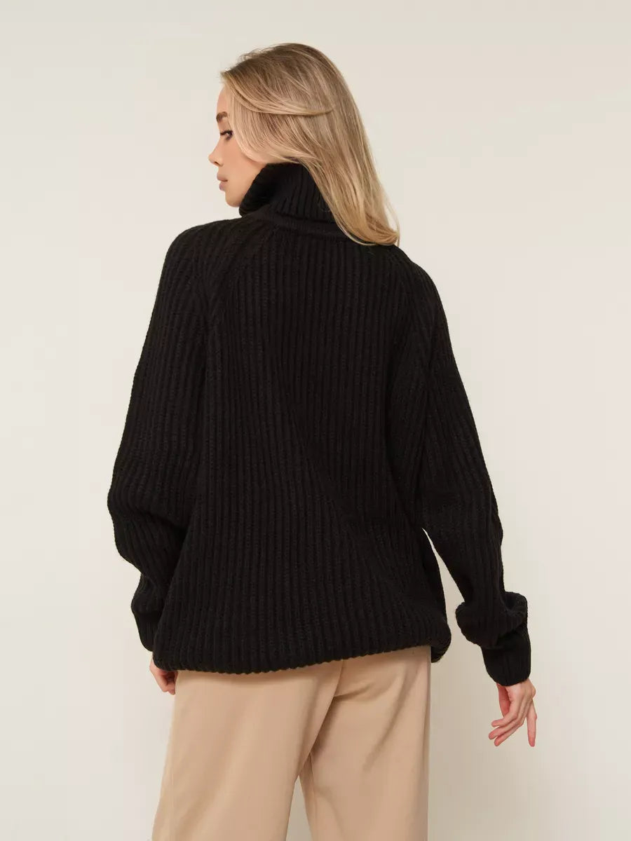 Onyx Sweater by Lauven — Oversized black knitwear with cozy turtleneck and ribbed texture.