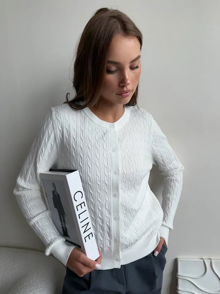 Ivory Cardigan by Lauven, a lightweight cable knit sweater in a classic ivory color.