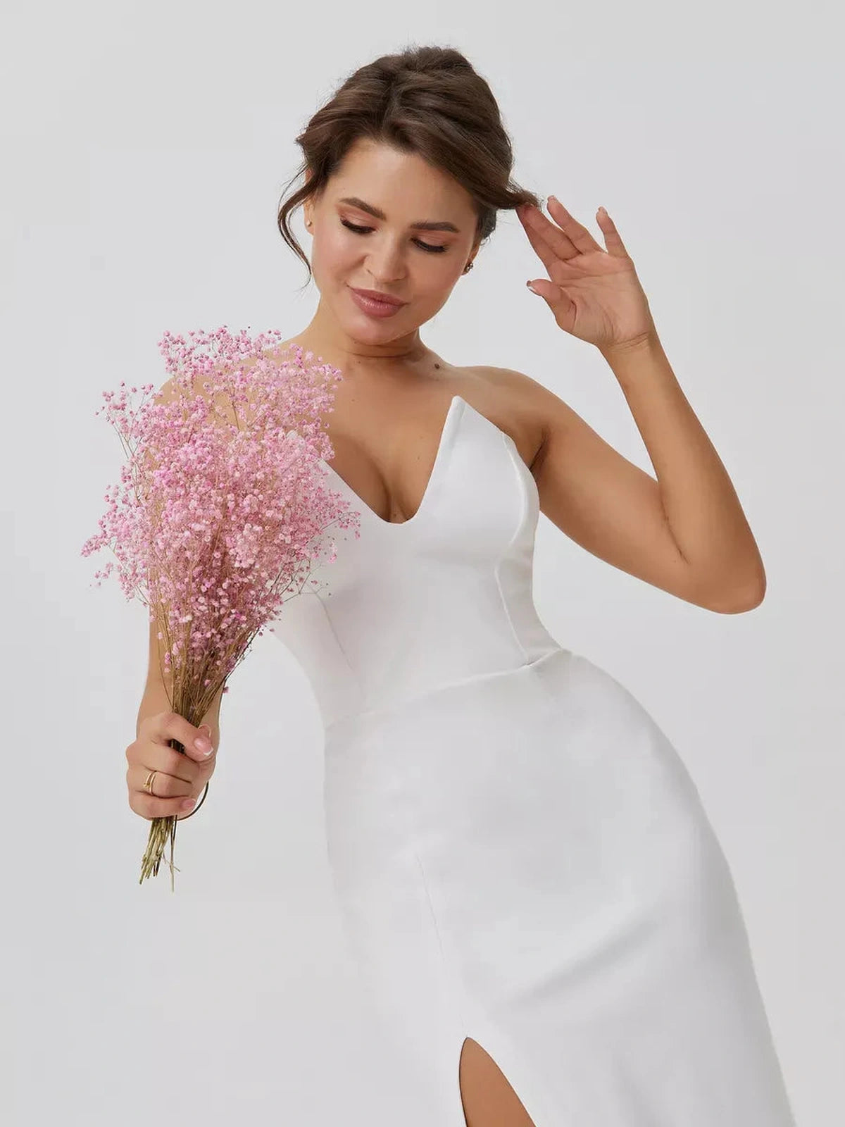 Lunaria Maxi Dress by Lauven, showcasing minimalist elegance with a sculpted fit and delicate front slit.