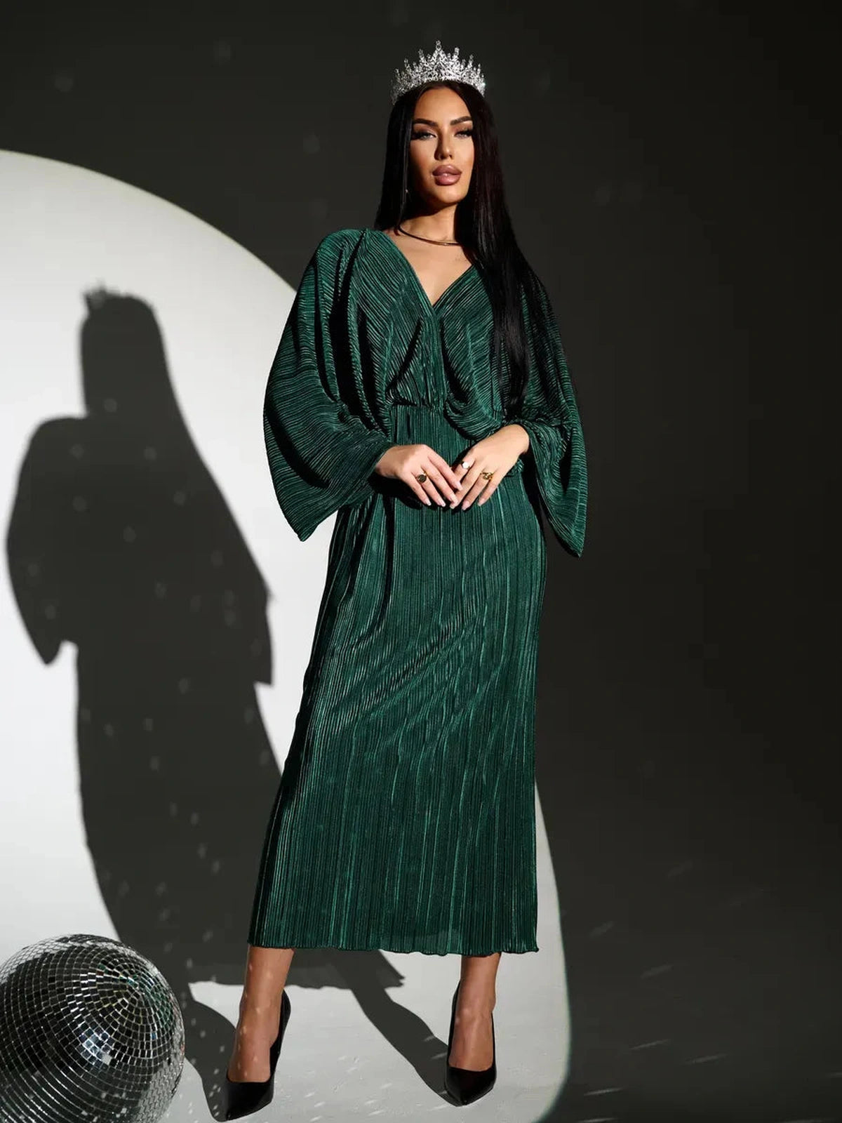 Astra Midi Dress by Lauven, emerald pleated dress featuring a flowing silhouette and V-neckline.