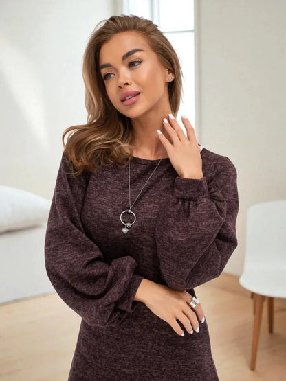 Auburn Midi Dress by Lauven showcasing elegant knit comfort and balloon sleeves, perfect for day to evening transitions.