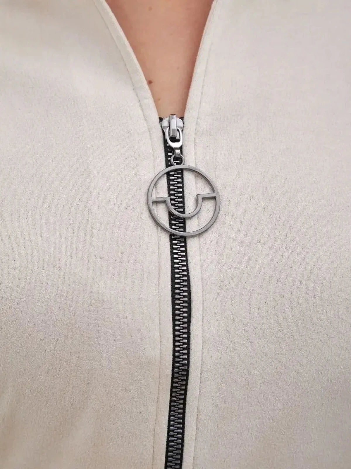 Sedona Mini Dress zip-front detail with polished zipper pull from Lauven, showcasing minimalist elegance.