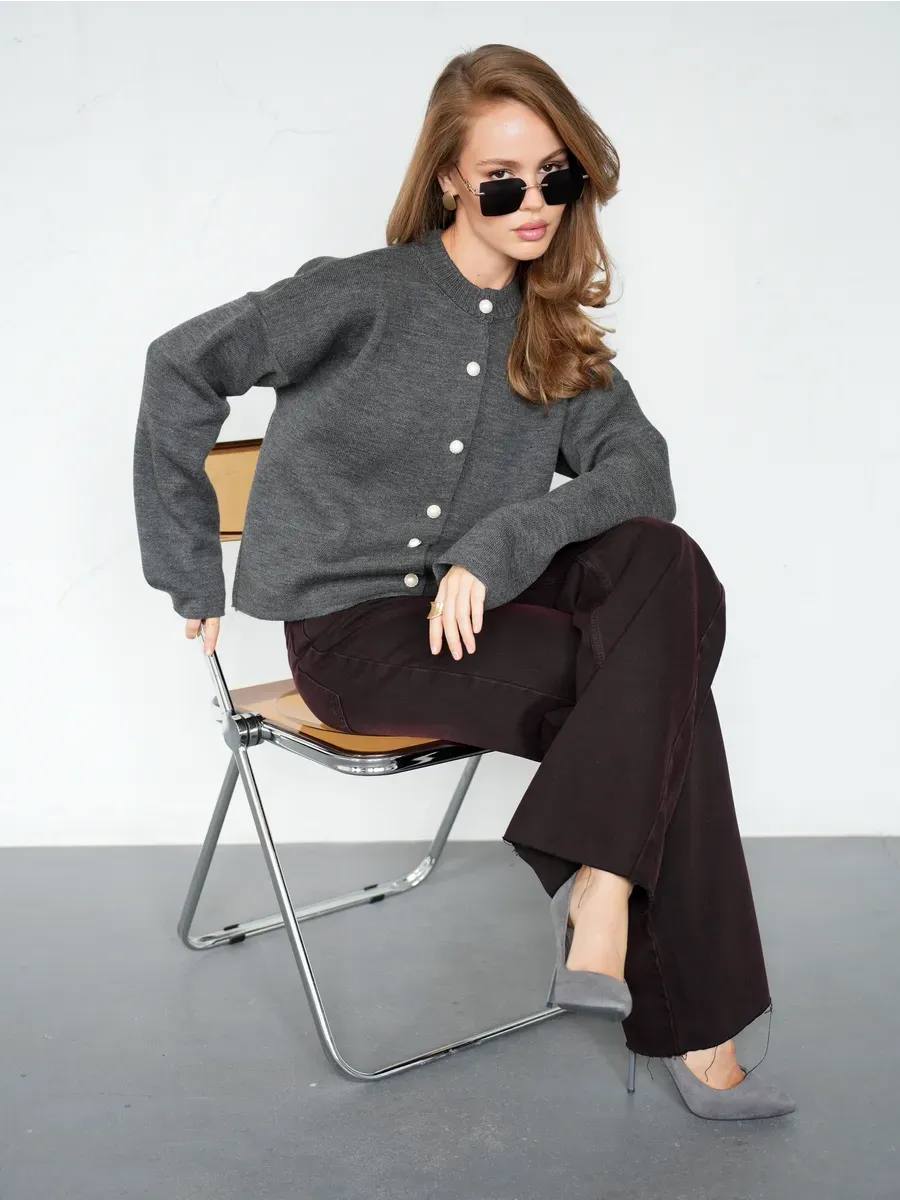 Asher Cardigan by Lauven worn with sunglasses, showcasing warm graphite knitwear in a stylish outfit.