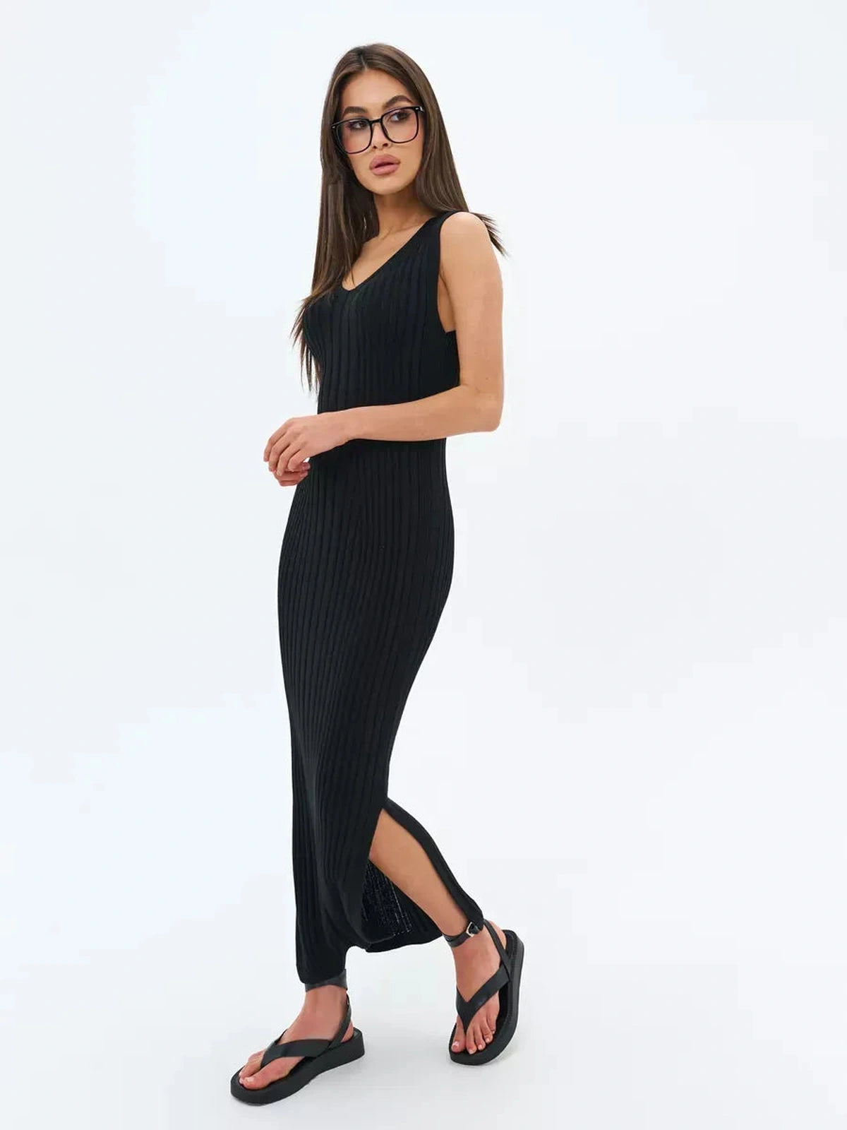 Noir Midi Dress by Lauven, a timeless black ribbed knit dress with V-neckline and sleek silhouette for versatile styling.