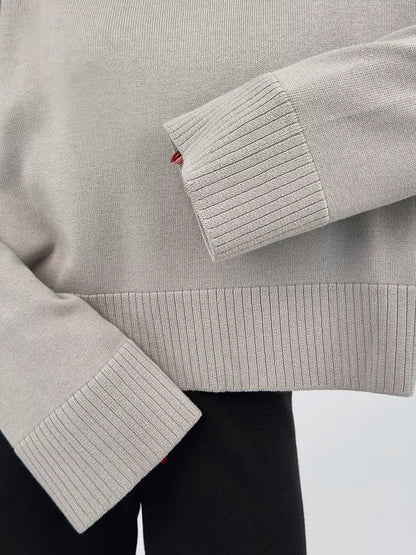 Arden Sweater by Lauven, oversized gray cotton blend knitwear with ribbed cuffs and hem detail.