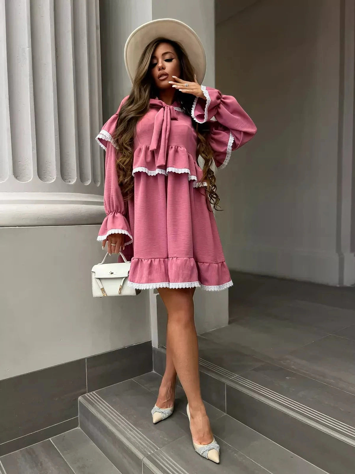 Rosea Mini Dress by Lauven featuring elegant ruffles and lace detail, perfect for modern feminine sophistication.