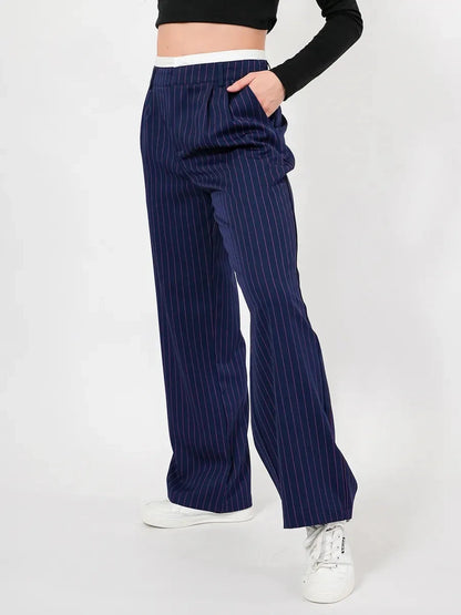 Aster Pants by Lauven featuring a high-waist, wide-leg design in navy with elegant pinstripes.