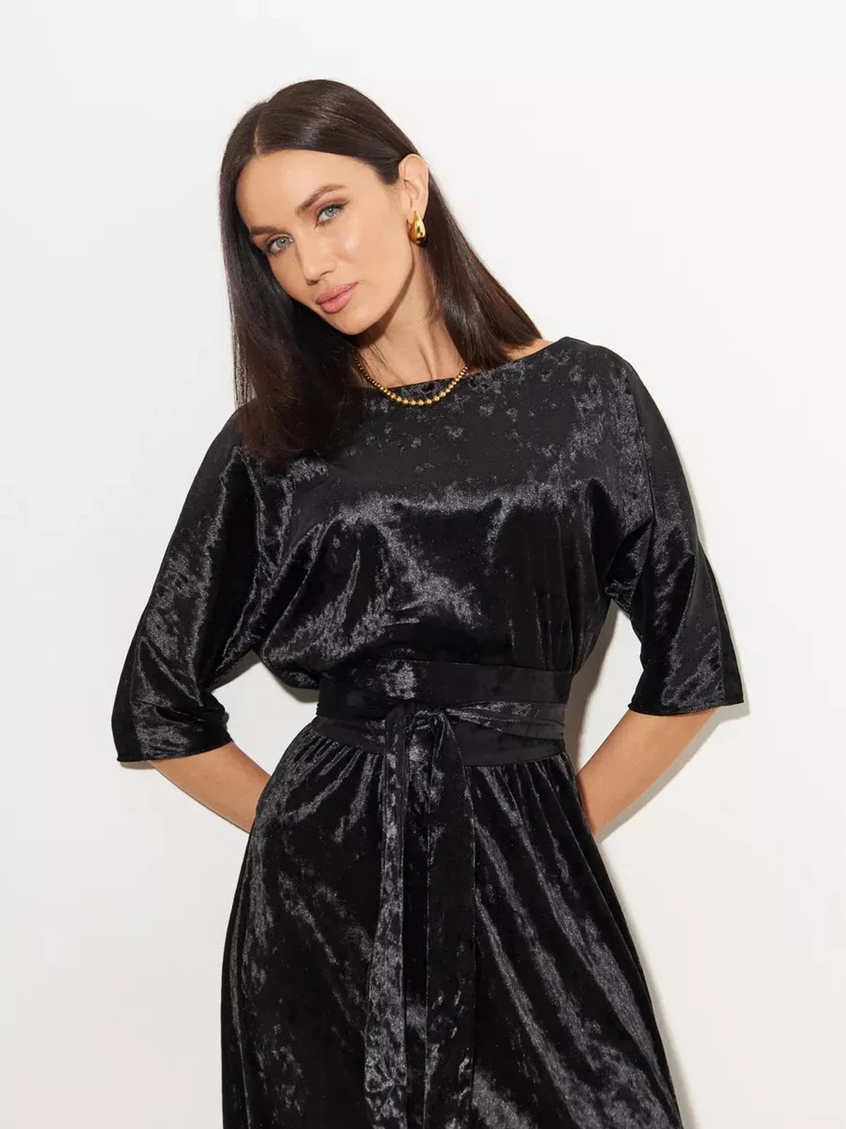 Noiré Maxi Dress by Lauven in black velvet, showcasing elegant A-line design and sophisticated silhouette.