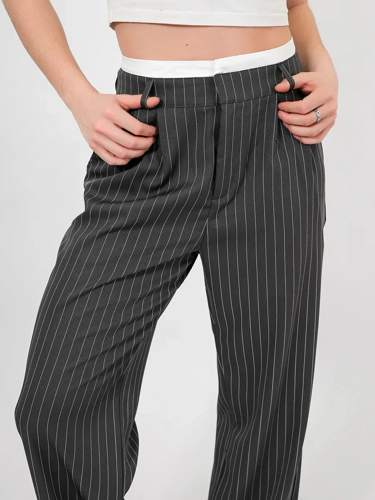 Luna Pants by Lauven, elegant high-waist wide-leg trousers featuring a subtle pinstripe pattern.