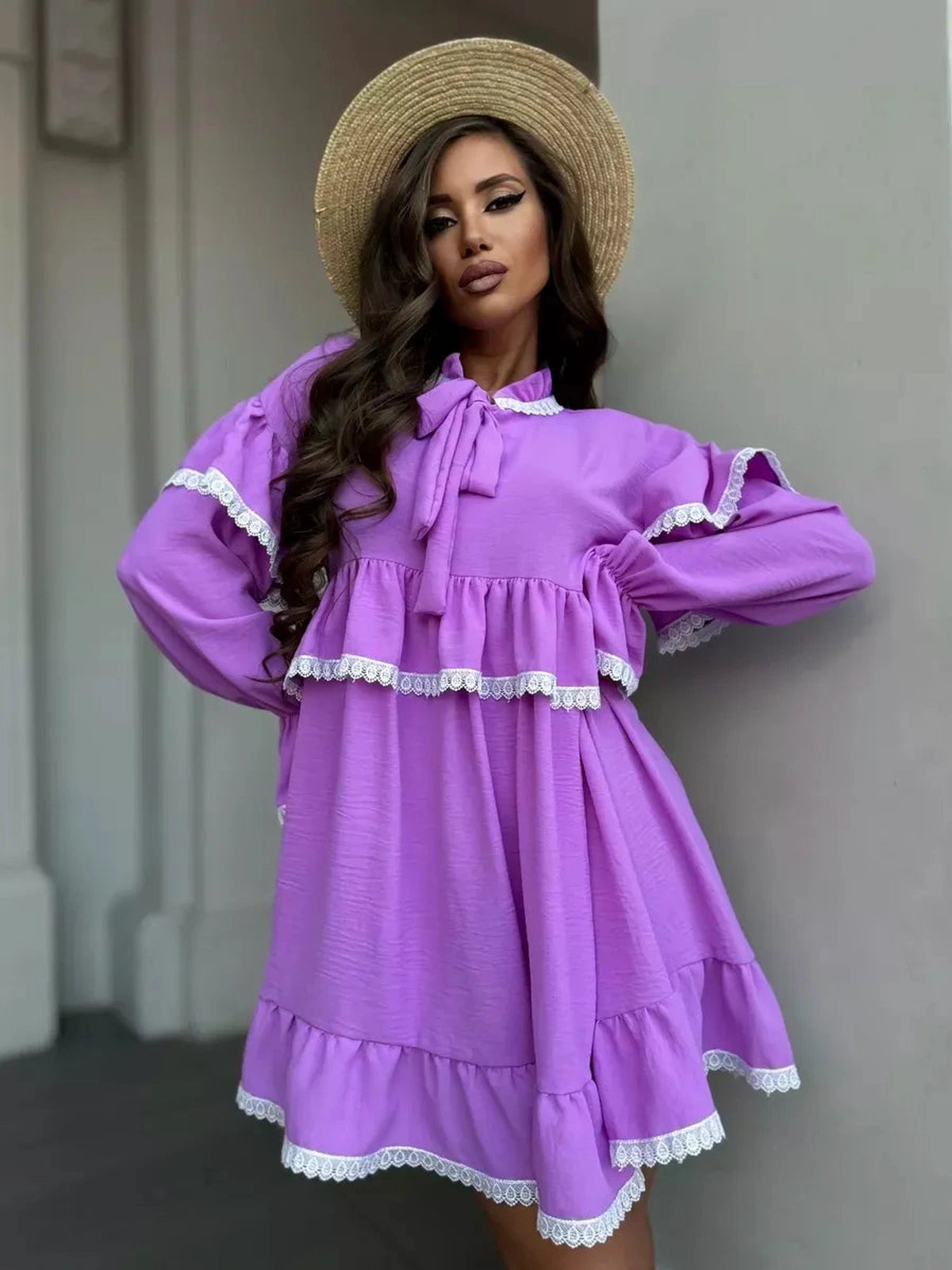 Violetta Mini Dress by Lauven featuring delicate lace and flowing ruffles in a vibrant lilac shade.