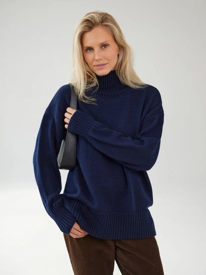 Celeste Sweater by Lauven: Oversized women’s wool knit turtleneck in dark navy, combining elegance and comfort.