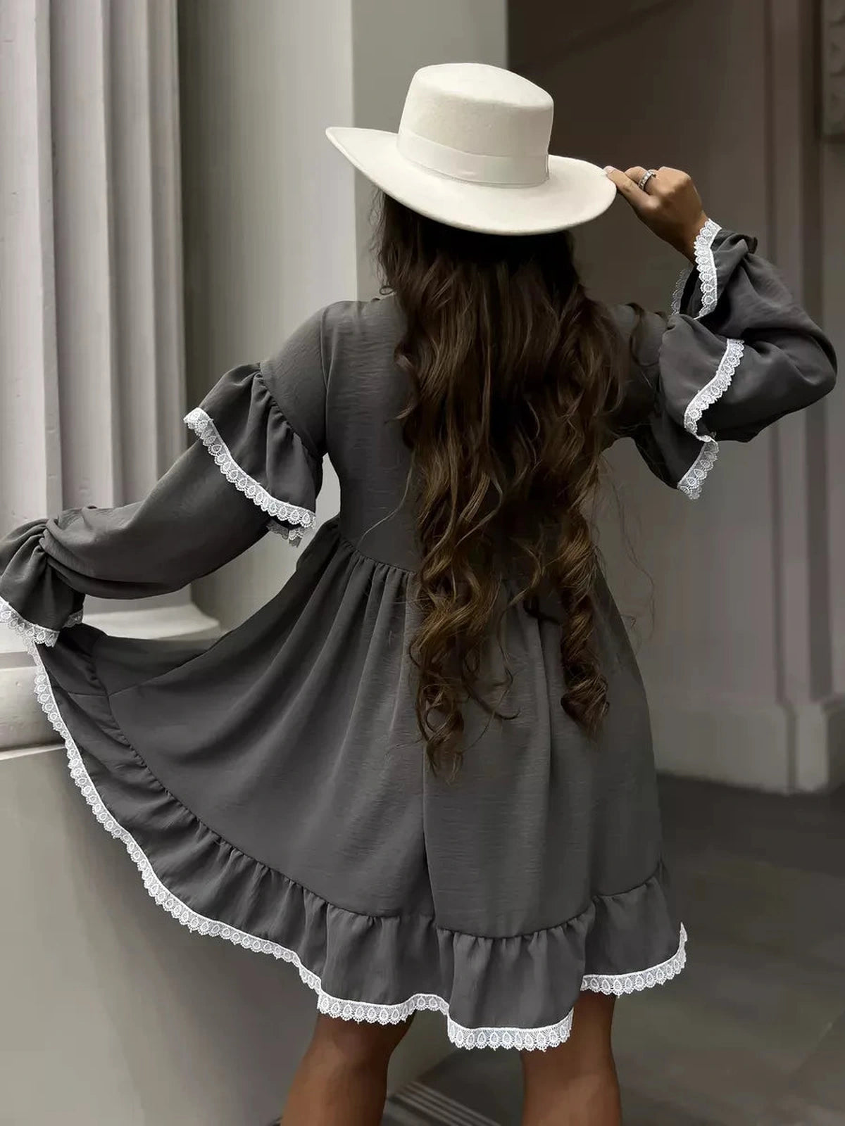 Luna Mini Dress by Lauven featuring elegant ruffled design and lace trim, perfect for stylish women's occasions.