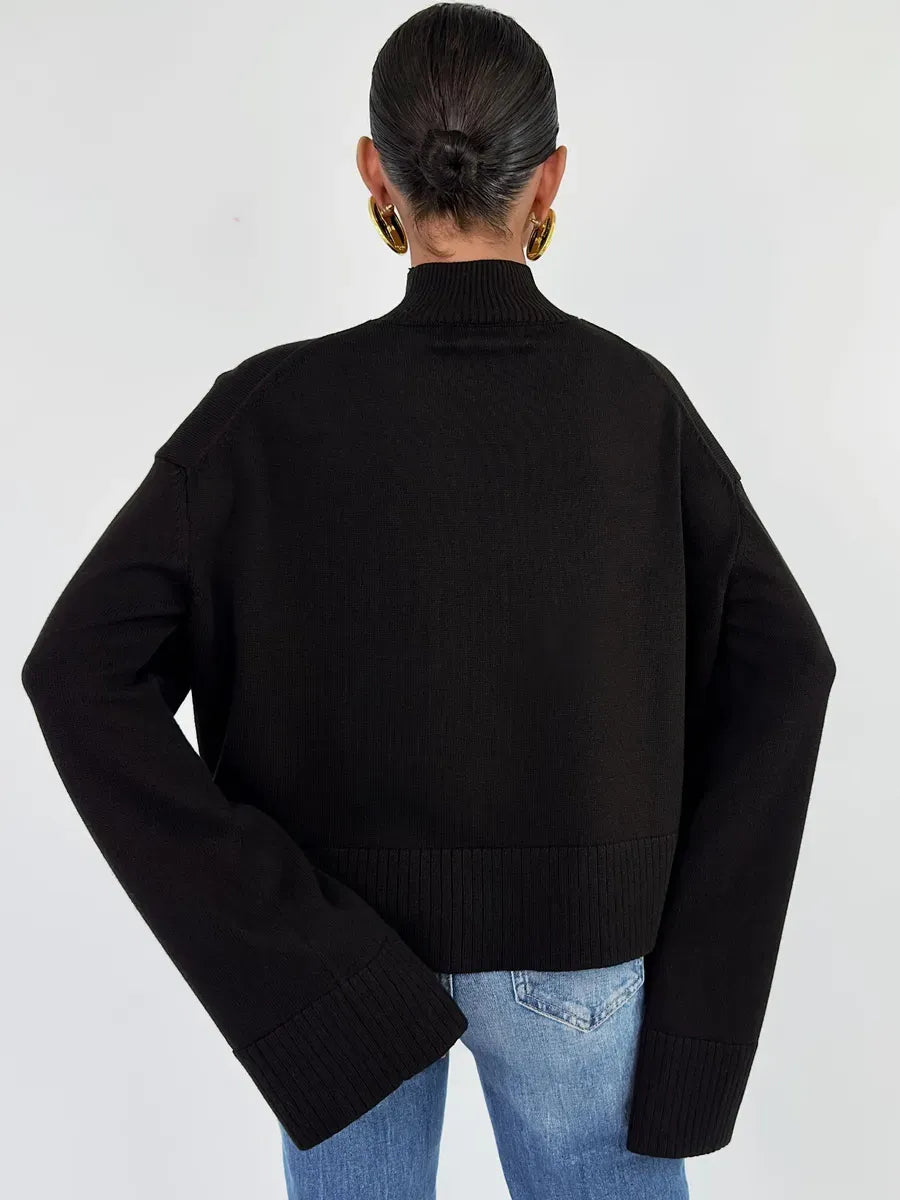 Noir Sweater by Lauven in oversized black knit, showcasing a chic back view and relaxed fit.