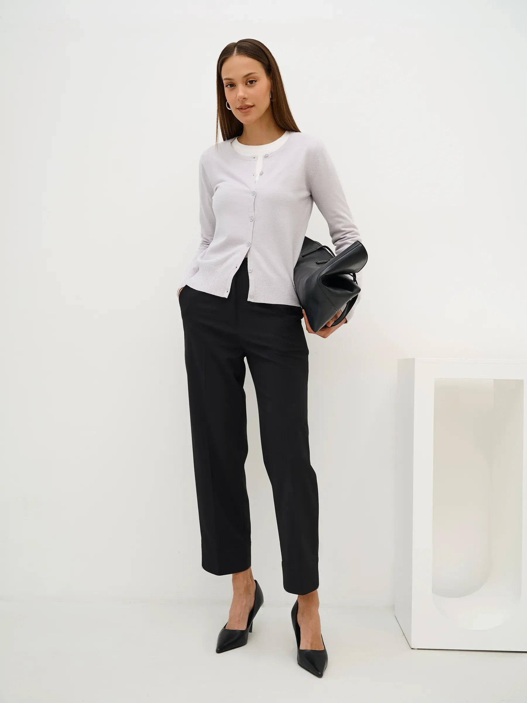 Luna Cardigan styled with black trousers, showcasing soft grey knitwear from Lauven, perfect for elegant casual wear.