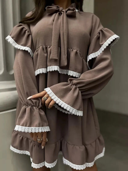 Aurora Mini Dress by Lauven featuring soft ruffles and delicate lace trim in a stylish brown.