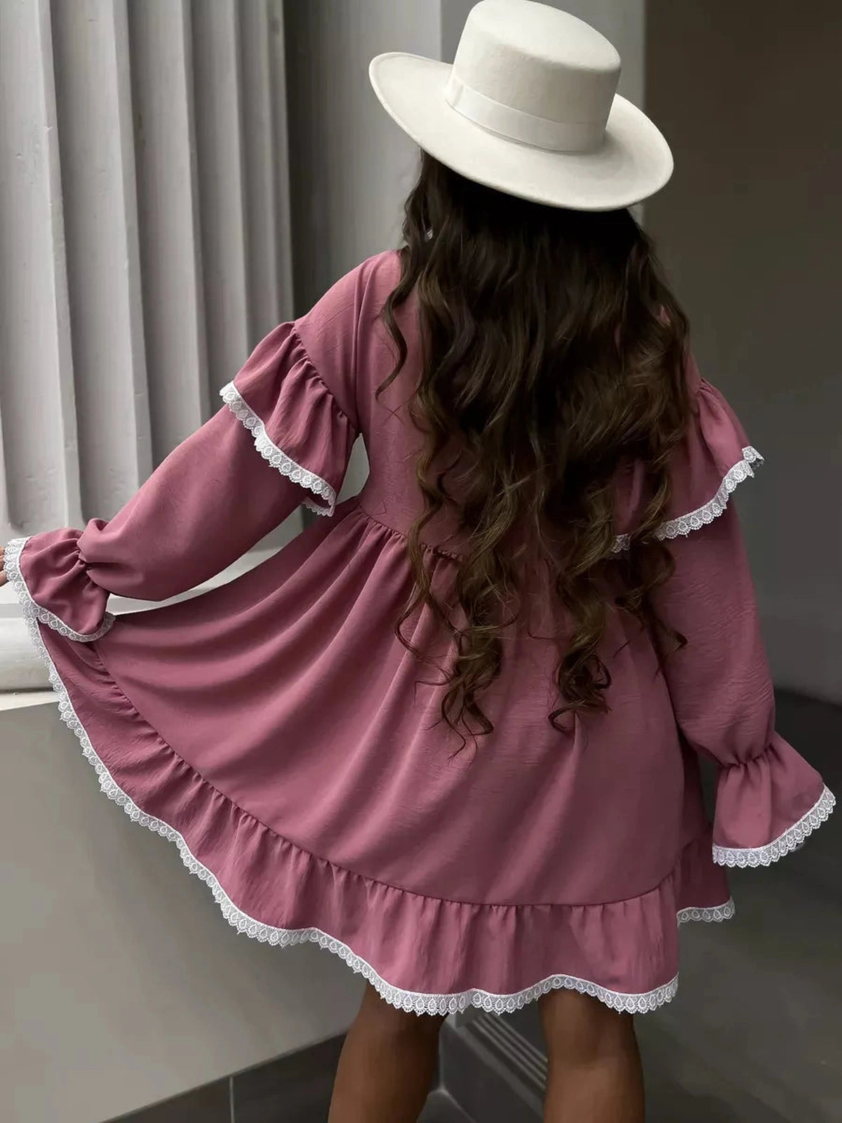 Rosea Mini Dress by Lauven featuring elegant ruffles and lace detail, perfect for modern feminine style.