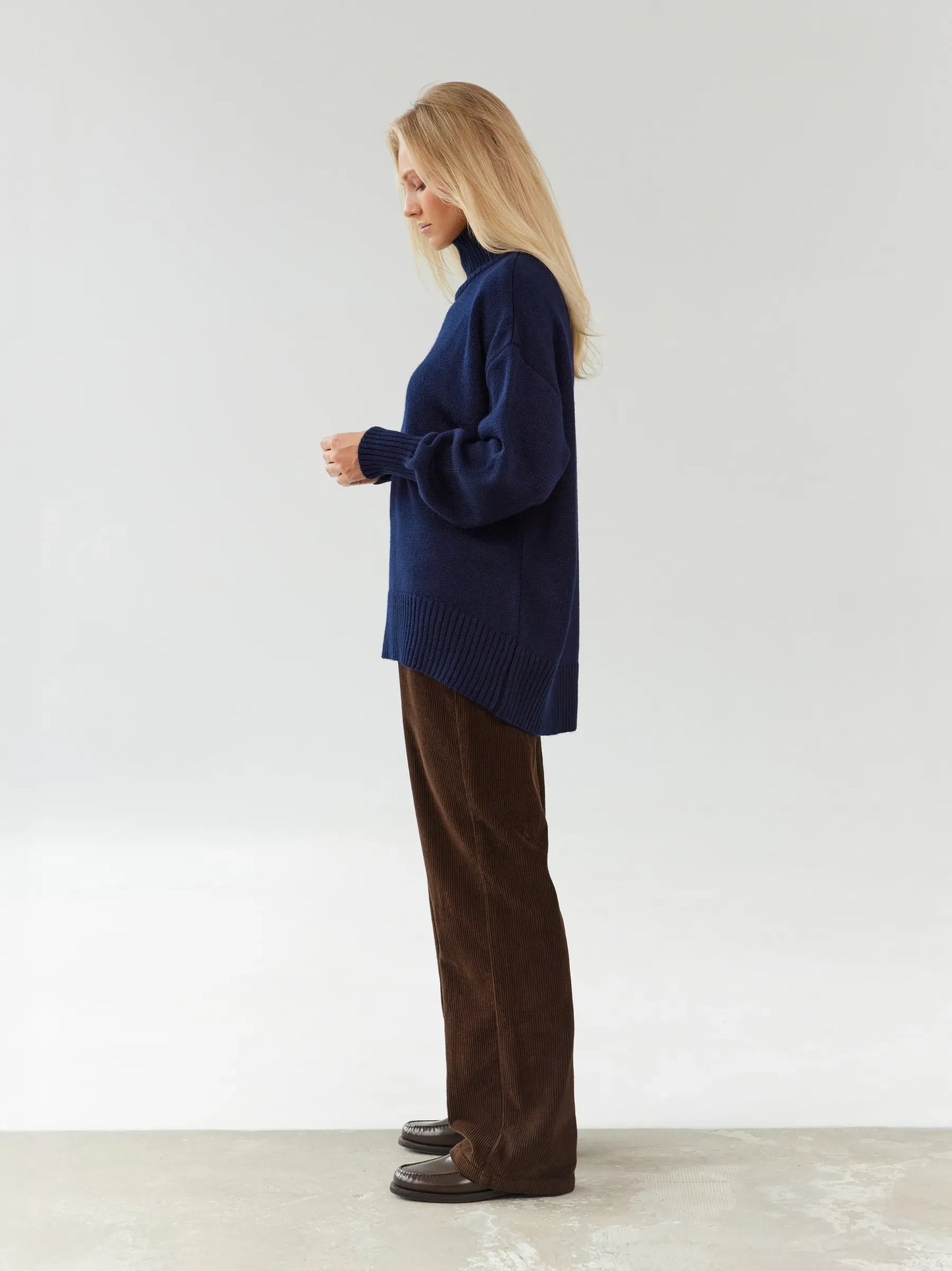 Celeste Sweater by Lauven: Oversized women's wool knit turtleneck in dark navy, perfect for cozy style and comfort.