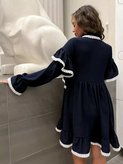 Celeste Mini Dress by Lauven featuring graceful ruffles and lace accents in dark navy.