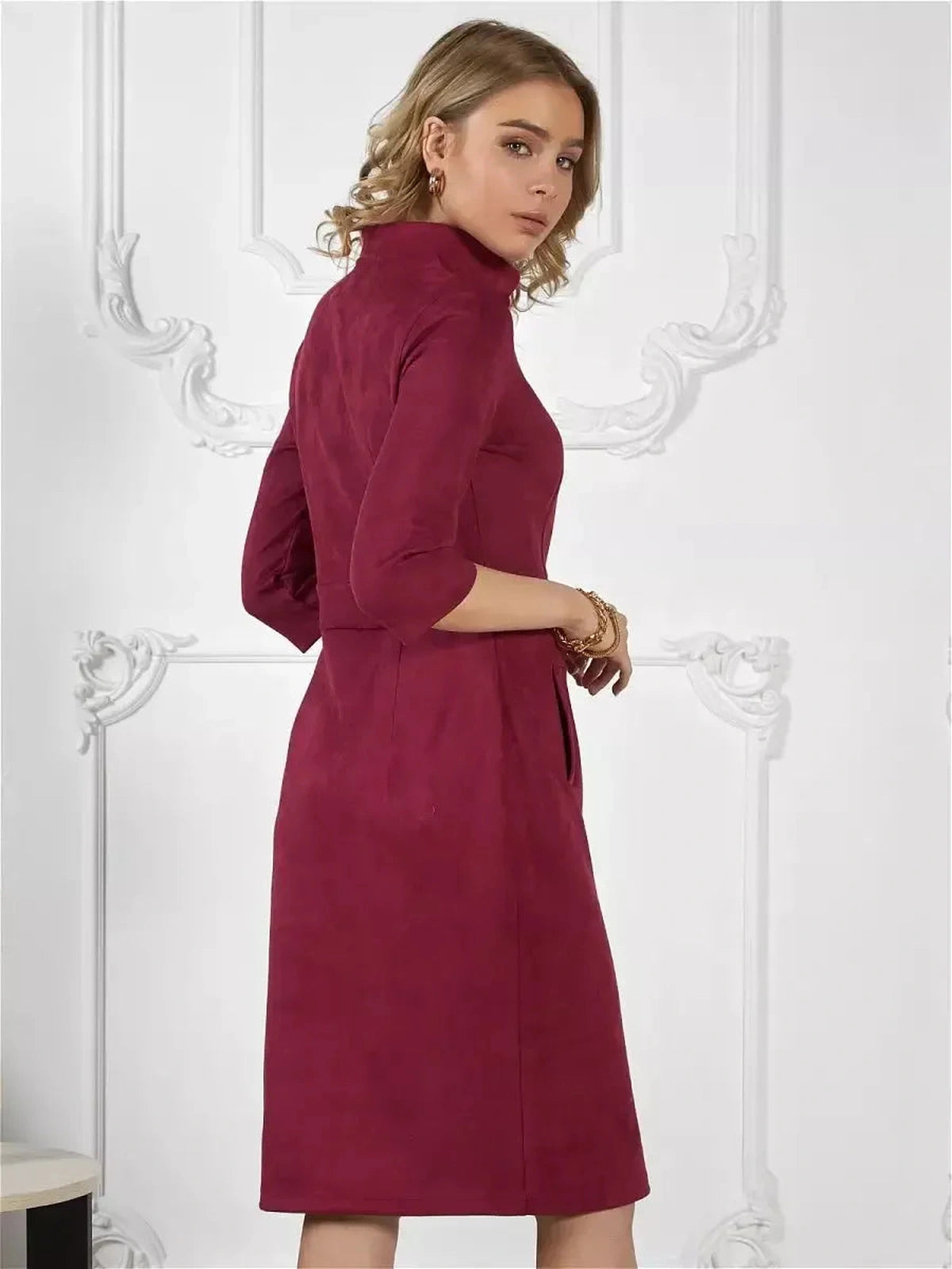 Meridian Mini Dress by Lauven in burgundy, showcasing structured zip-front silhouette and elegant design.